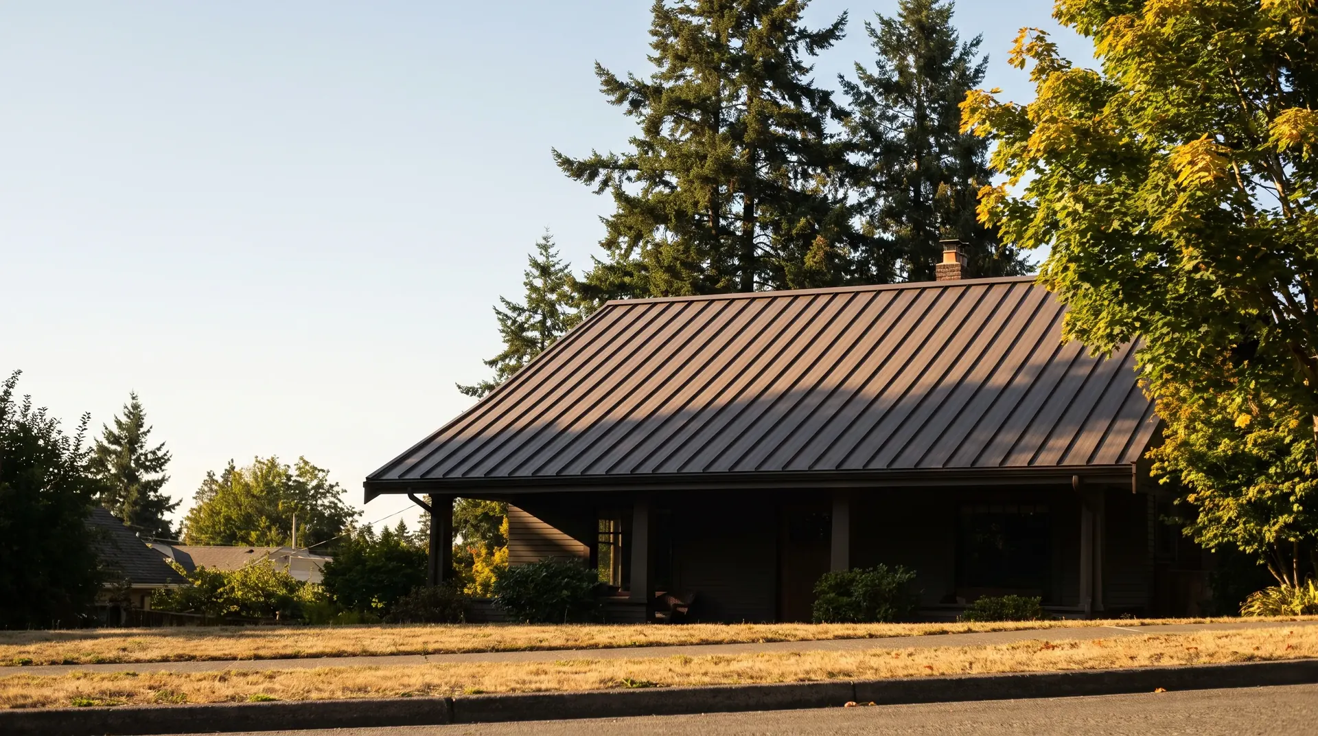 Craftsman home in Bellingham with a new dark bronze standing seam metal roof
